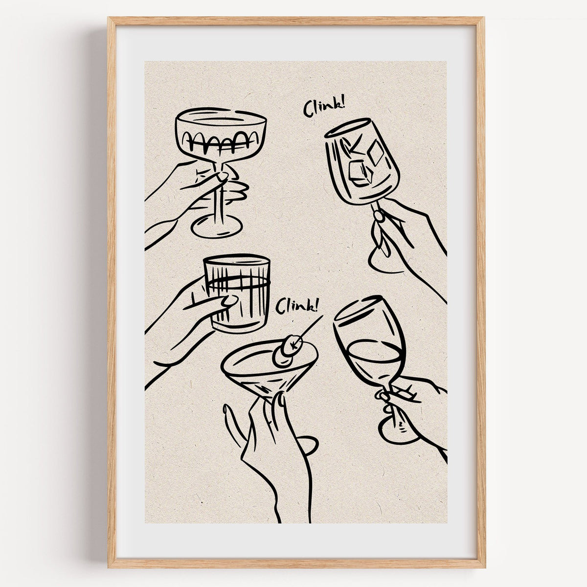 Clink! black line-art cocktail toast print in a light oak frame on a plain white wall