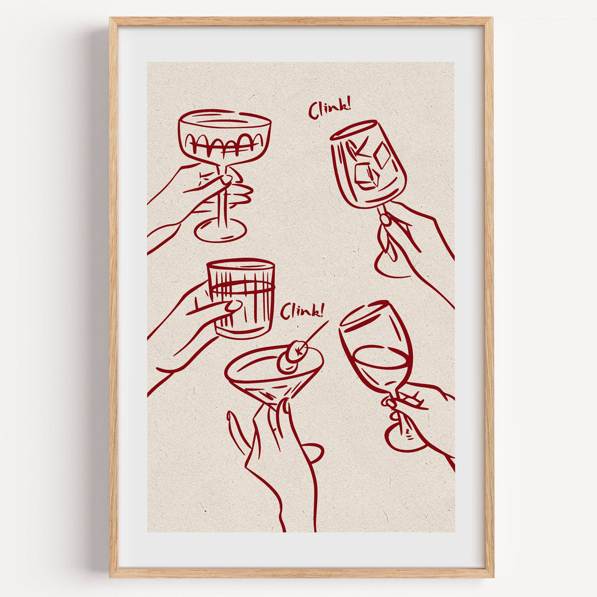 Clink! wine-red cocktail toast print in a light oak frame on a plain white wall