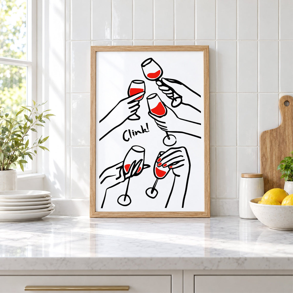 Clink five hands red wine toast print in an oak frame leaning on a marble counter by white tiles and lemons