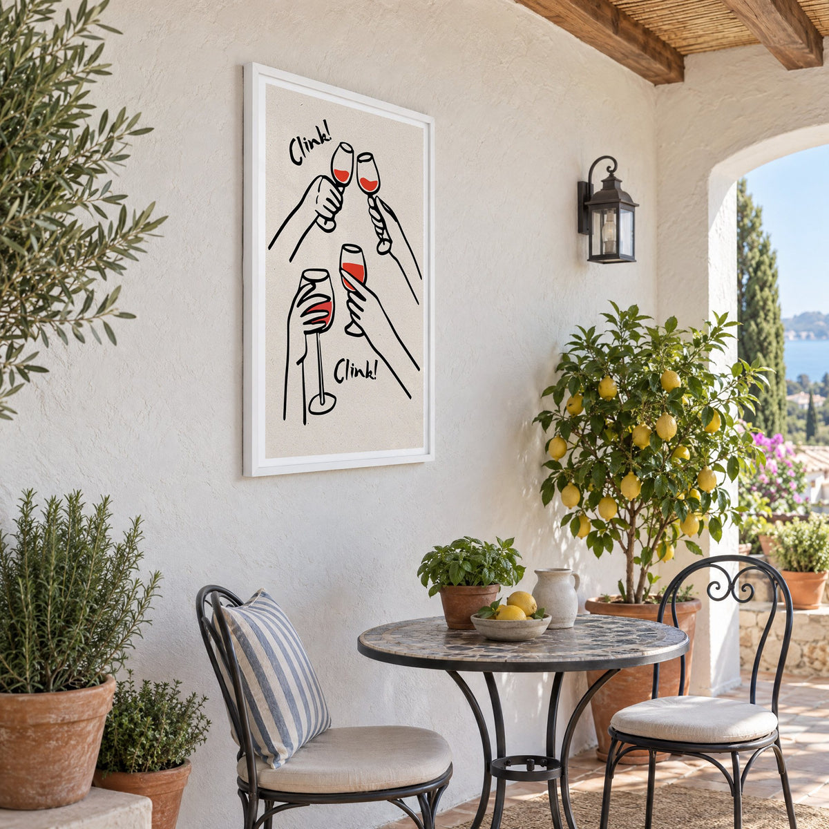 Clink! red wine toast kraft print in a white frame on a sunny patio wall beside a potted lemon tree