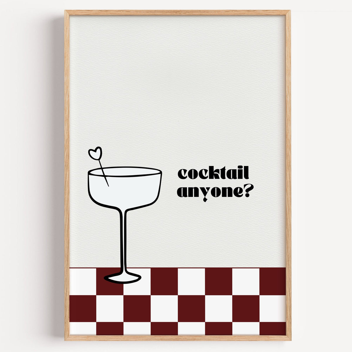 Cocktail anyone coupe check print in a light oak frame on a plain white wall