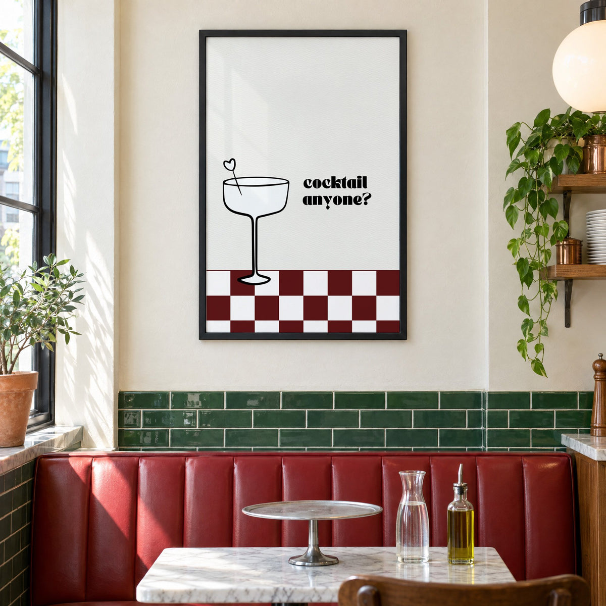 Cocktail anyone coupe check print in a black frame above a red leather booth in a sunny pizzeria
