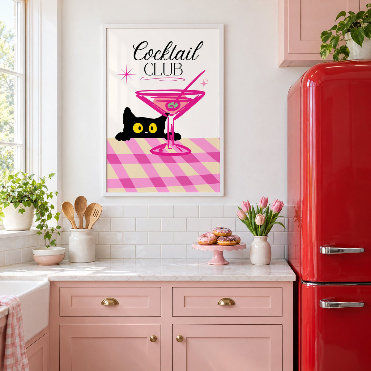 Cocktail Club black cat martini print in a white frame in a pink kitchen beside a red retro fridge