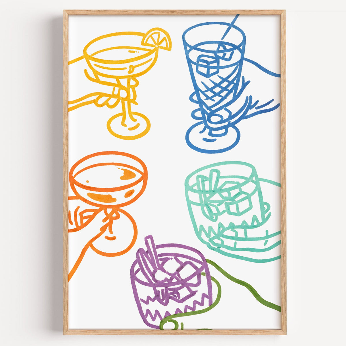 Colourful cocktail glasses print in a light oak frame on a plain white wall