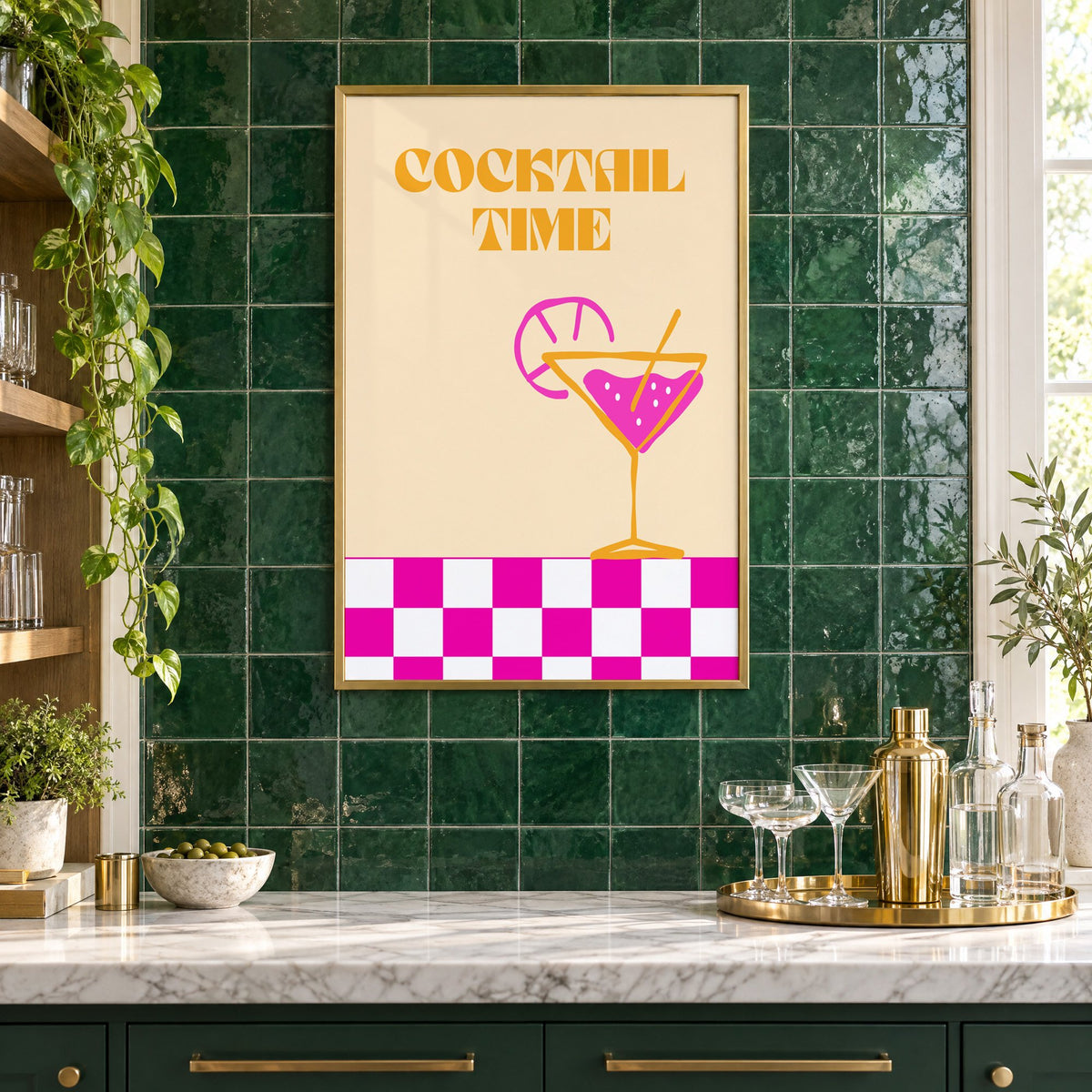 Cocktail Time martini checkerboard print in a brass frame on emerald green tiles above a home bar with coupe glasses