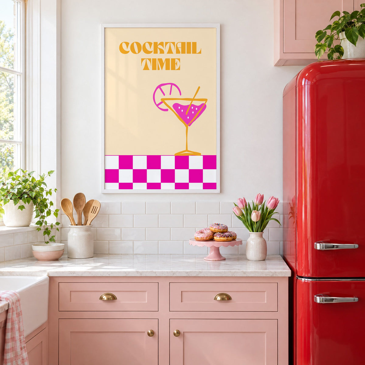 Cocktail Time martini checkerboard print in a white frame in a pink kitchen beside a red retro fridge