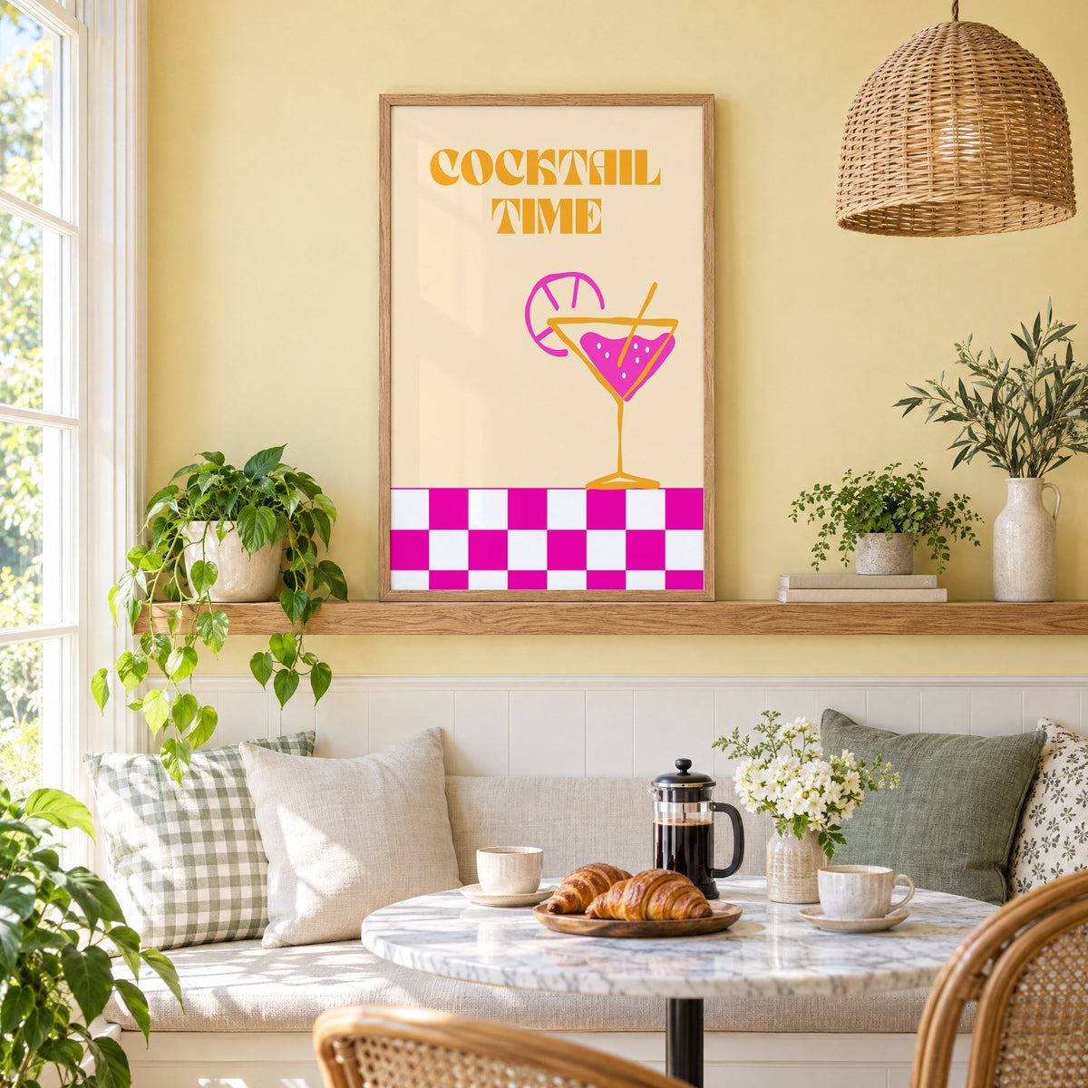 Cocktail Time martini checkerboard print in an oak frame on a picture ledge above a sunny breakfast nook