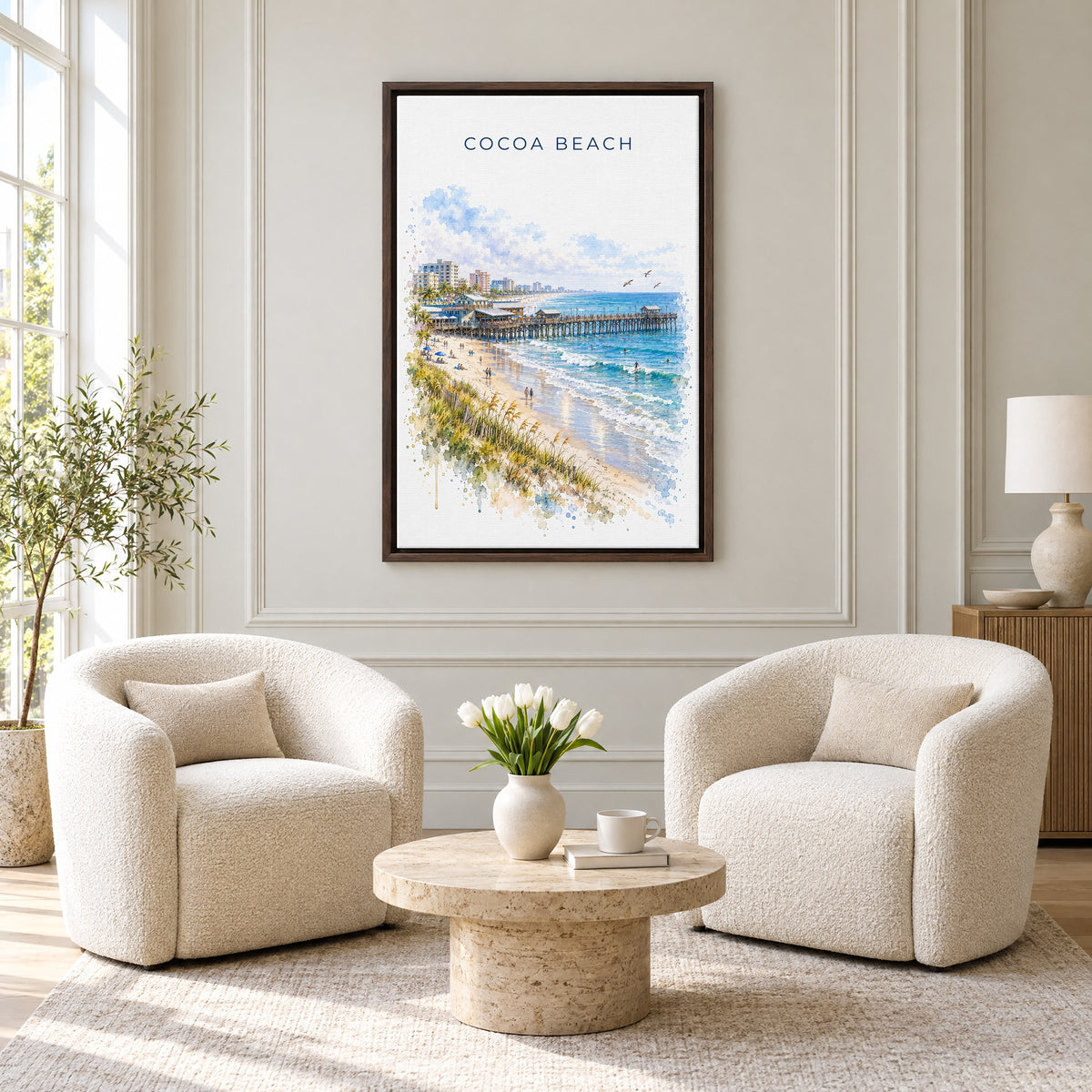 Cocoa Beach watercolor print as an espresso floater canvas above two boucle armchairs in a hotel lounge