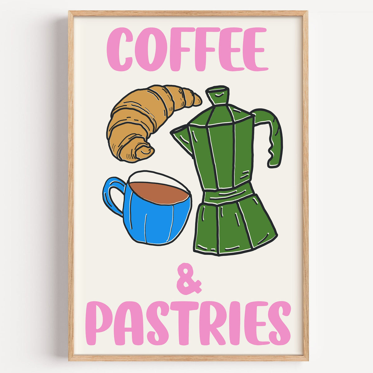 Coffee and pastries print in a light oak frame on a plain white wall