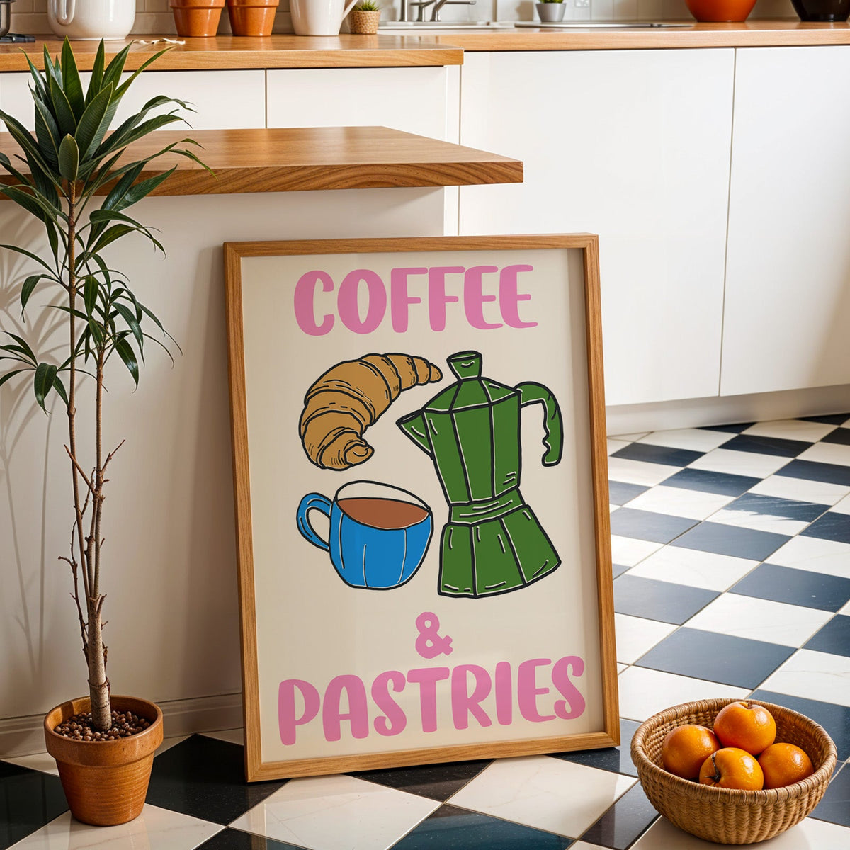 Coffee and pastries print in an oak frame by a kitchen island and checkered floor