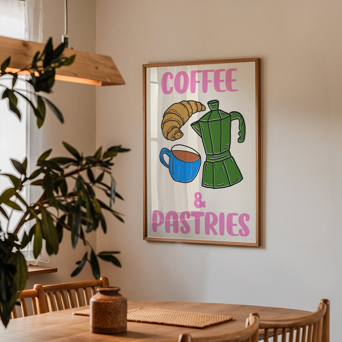Coffee and pastries print in a walnut frame above a dining table beside an olive tree