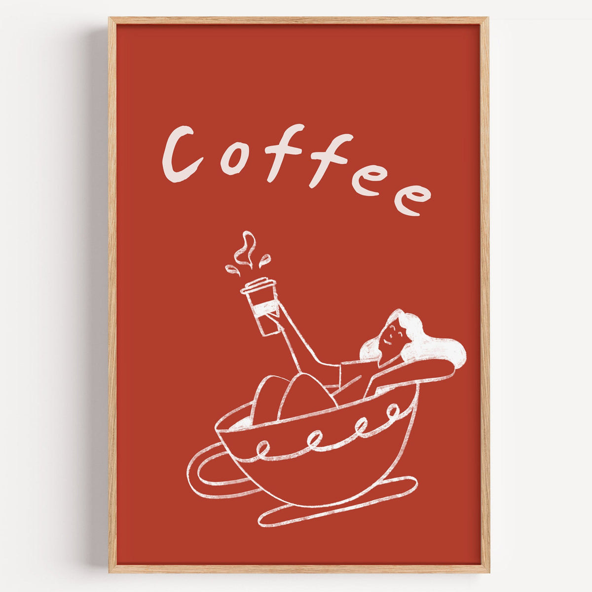 Coffee Bath rust line print in a light oak frame on a plain white wall
