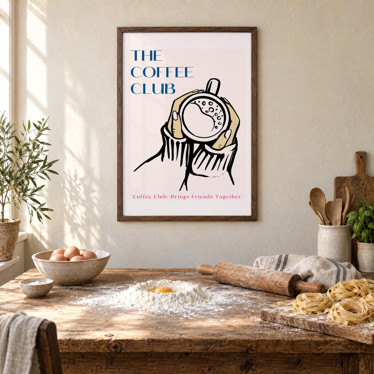 The Coffee Club hands and cup print in a walnut frame above a rustic table set for making fresh pasta