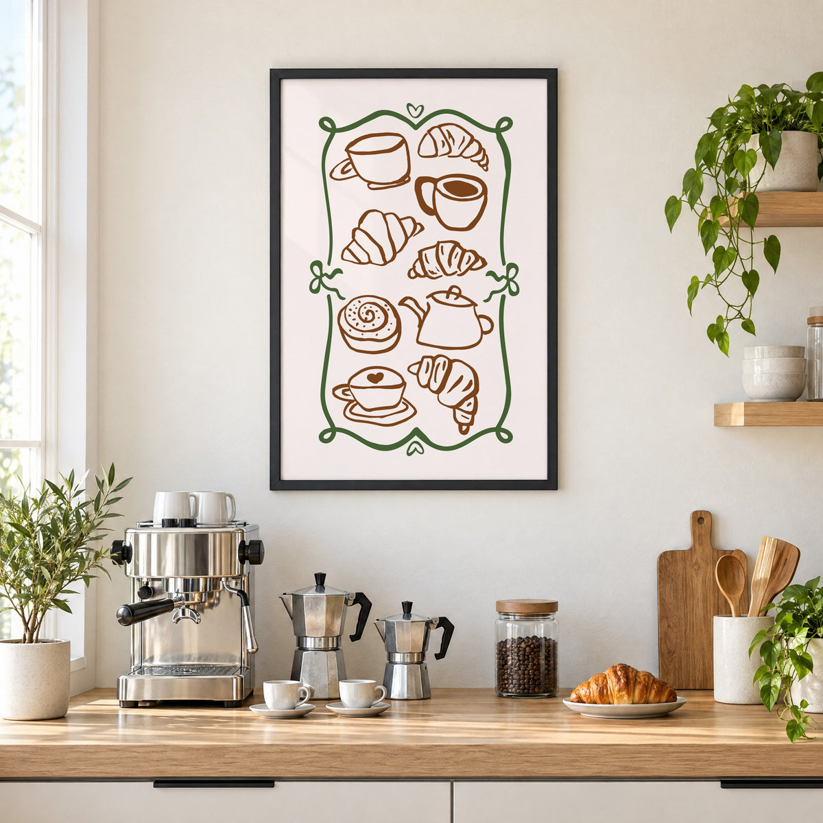 Coffee and croissant doodles green frame print in a black frame above a home espresso bar with moka pots and espresso cups