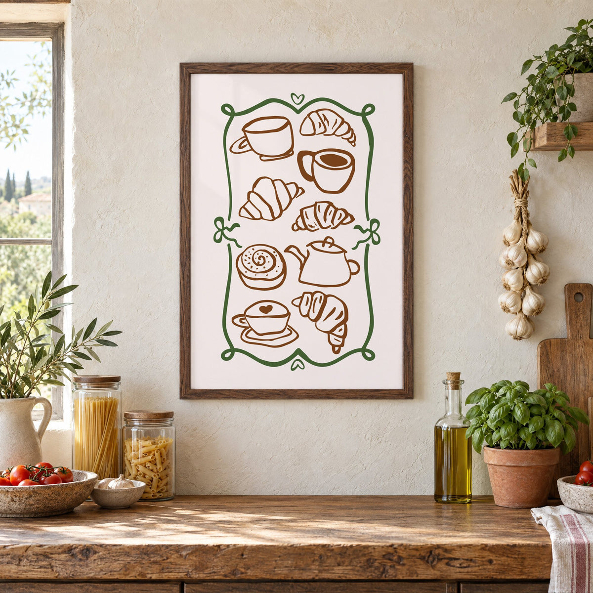 Coffee and croissant doodles green frame print in a walnut frame above a rustic Italian pantry counter with pasta jars, garlic and tomatoes