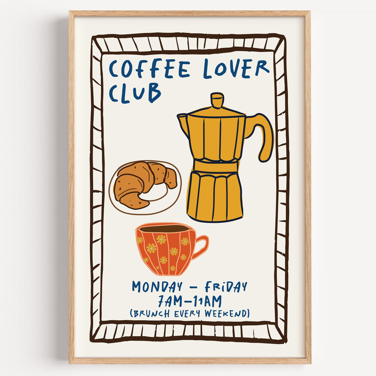 Coffee lover club moka pot print in a light oak frame on a plain white wall