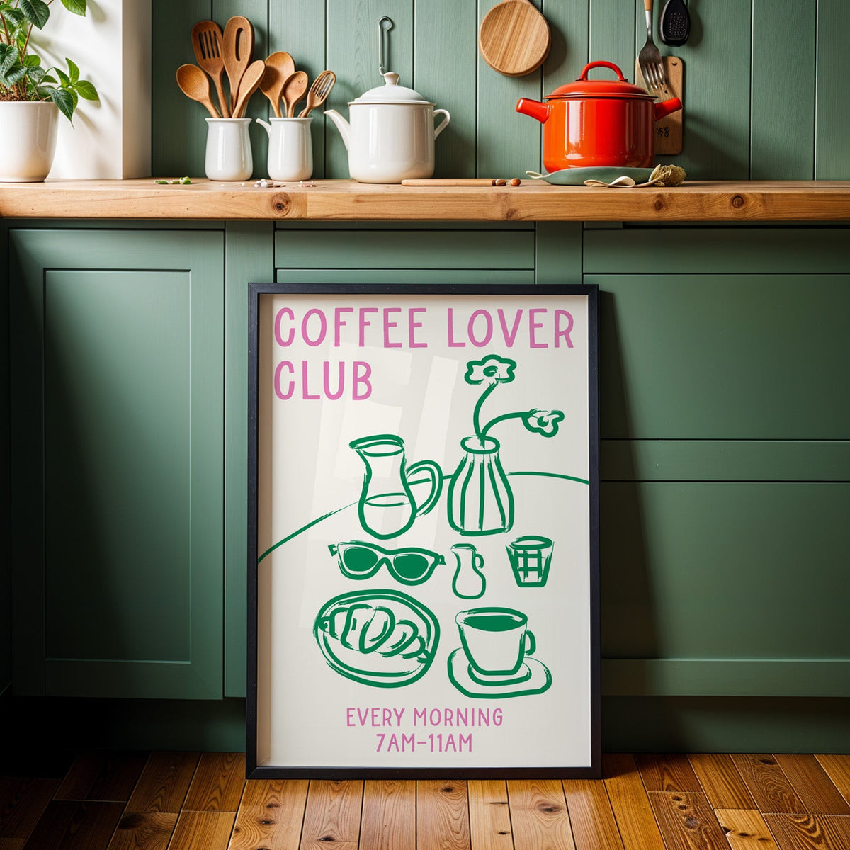 Coffee lover club morning print in a black frame against sage green kitchen cabinets