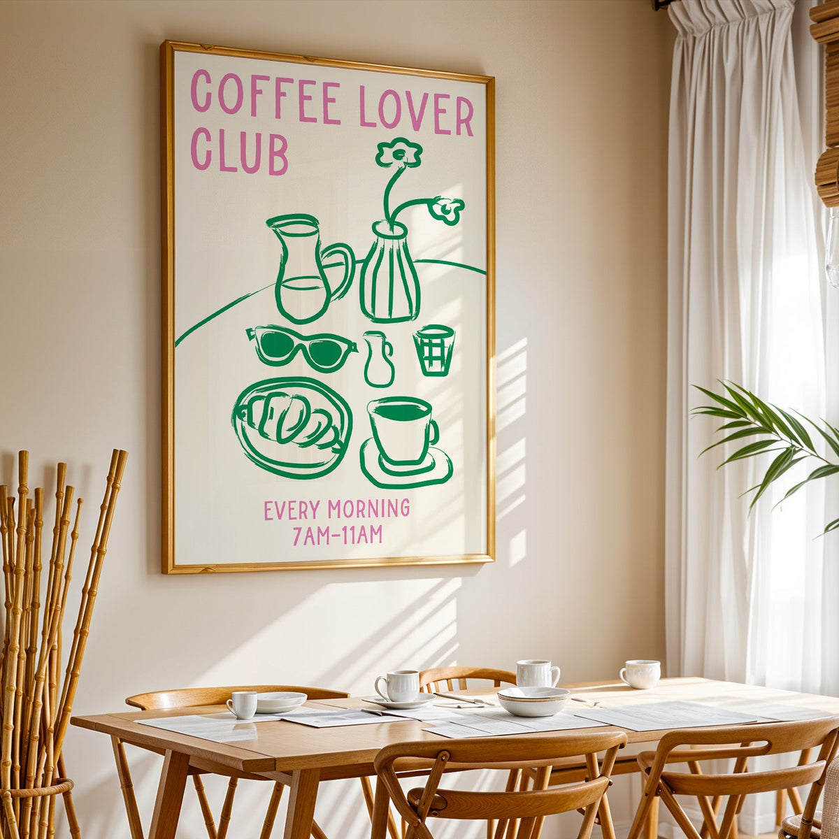 Coffee lover club morning print in a gold frame above a sunlit breakfast table