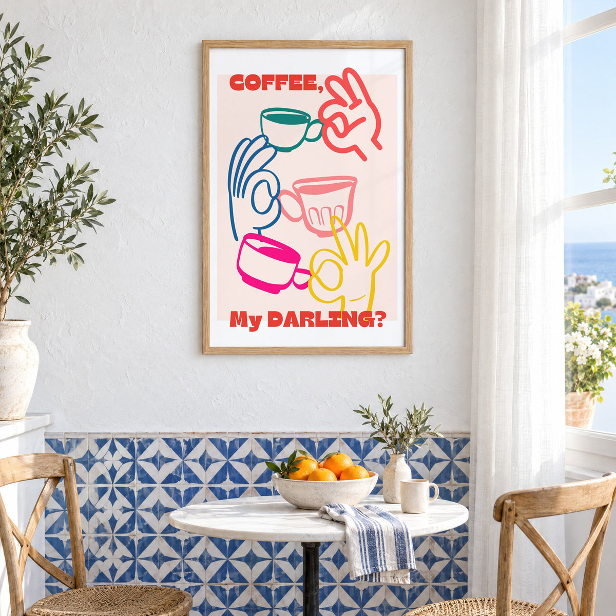 Coffee My Darling colorful hands print in an oak frame above a bistro table and blue patterned tiles