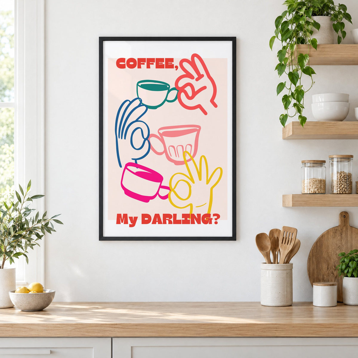 Coffee My Darling colorful hands print in a black frame in a white kitchen beside open wood shelves and glass jars