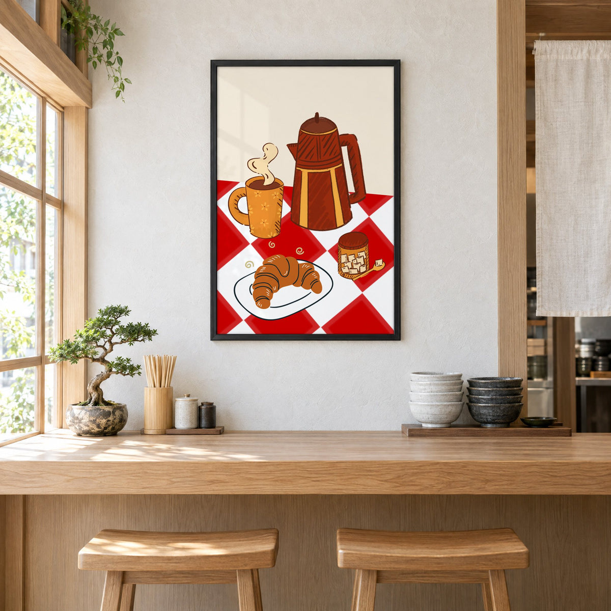 Coffee pot croissant red gingham print in a black frame above a light wood ramen counter with stools and stacked bowls