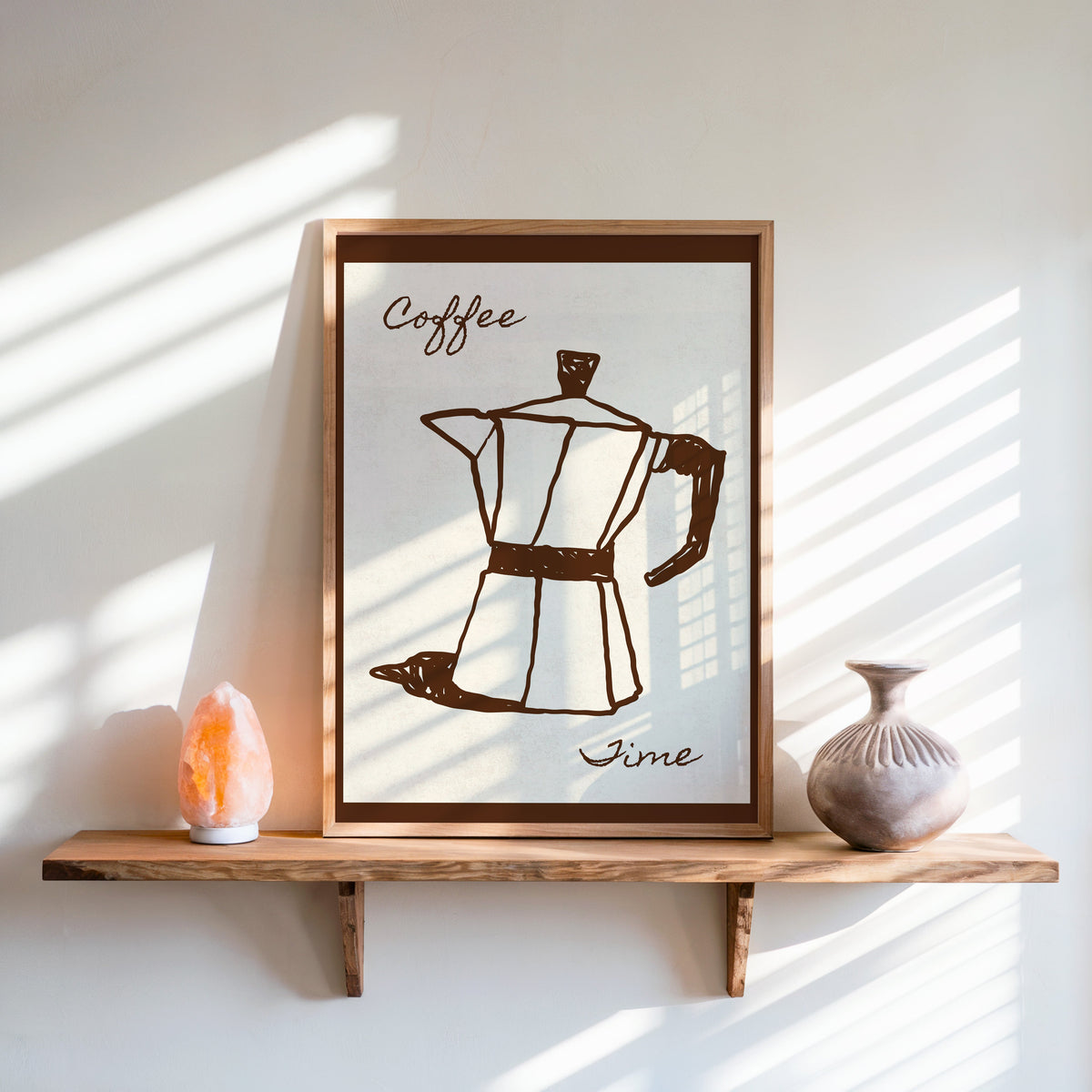 Coffee Time moka pot print in an oak frame on a live-edge shelf beside a salt lamp