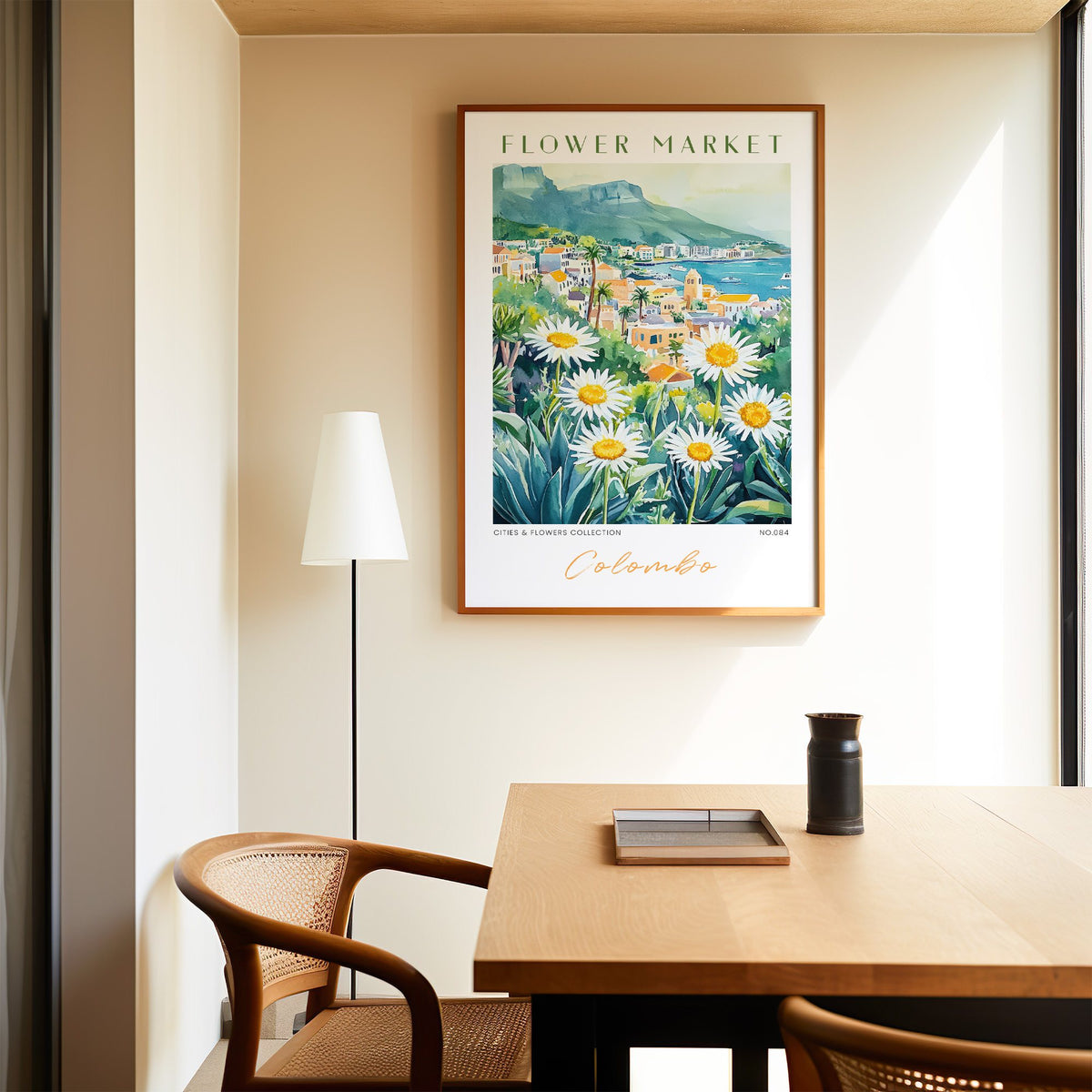 Colombo flower market print in an oak frame above a dining table and cane chair