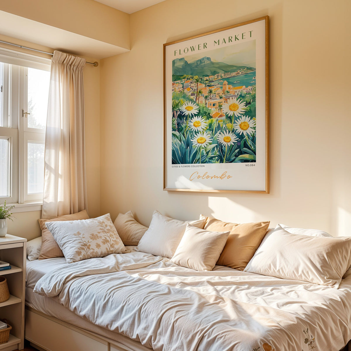 Colombo flower market print in an oak frame above a cream daybed in a sunny bedroom