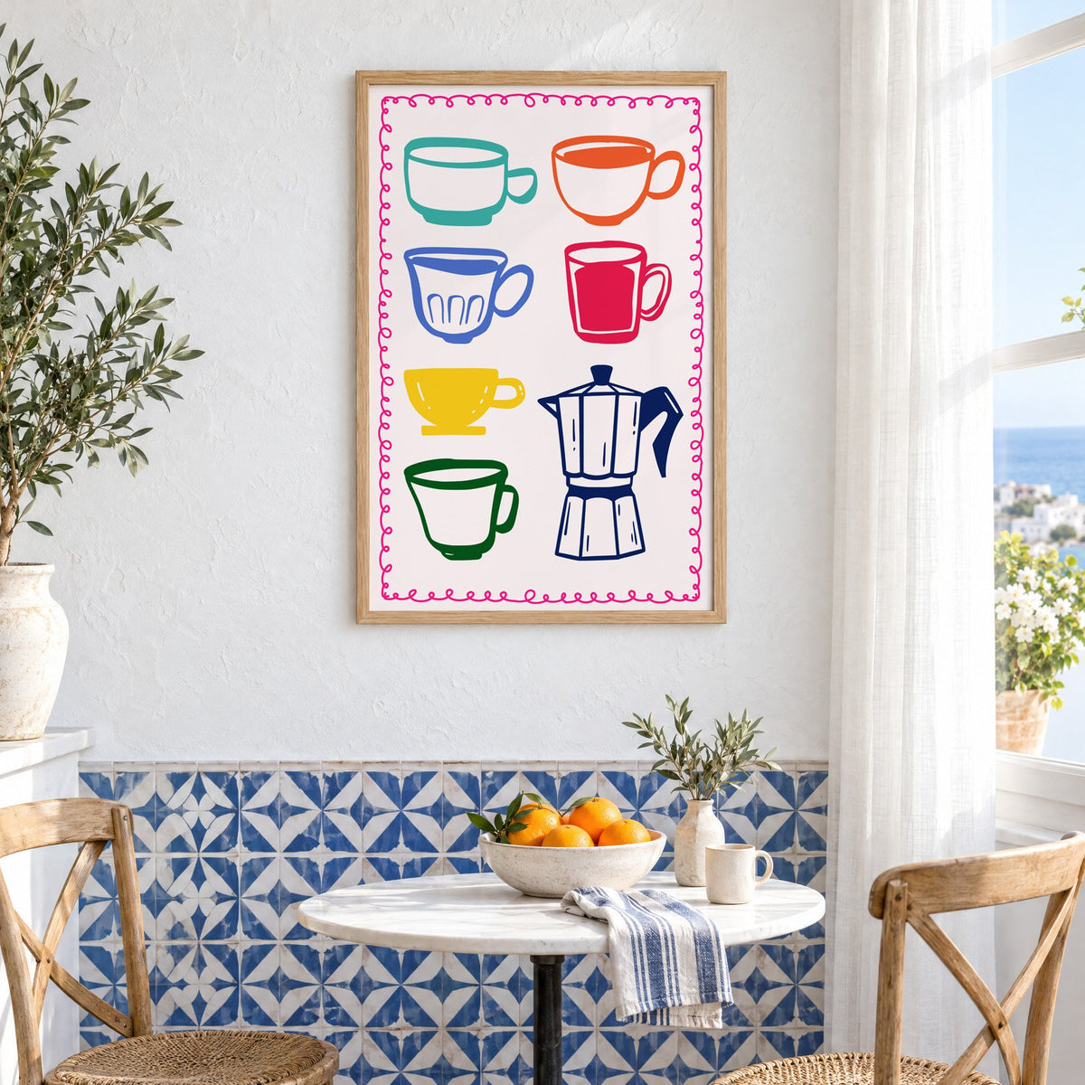 Colorful coffee cups and moka pot print in an oak frame above a bistro table and blue patterned tiles