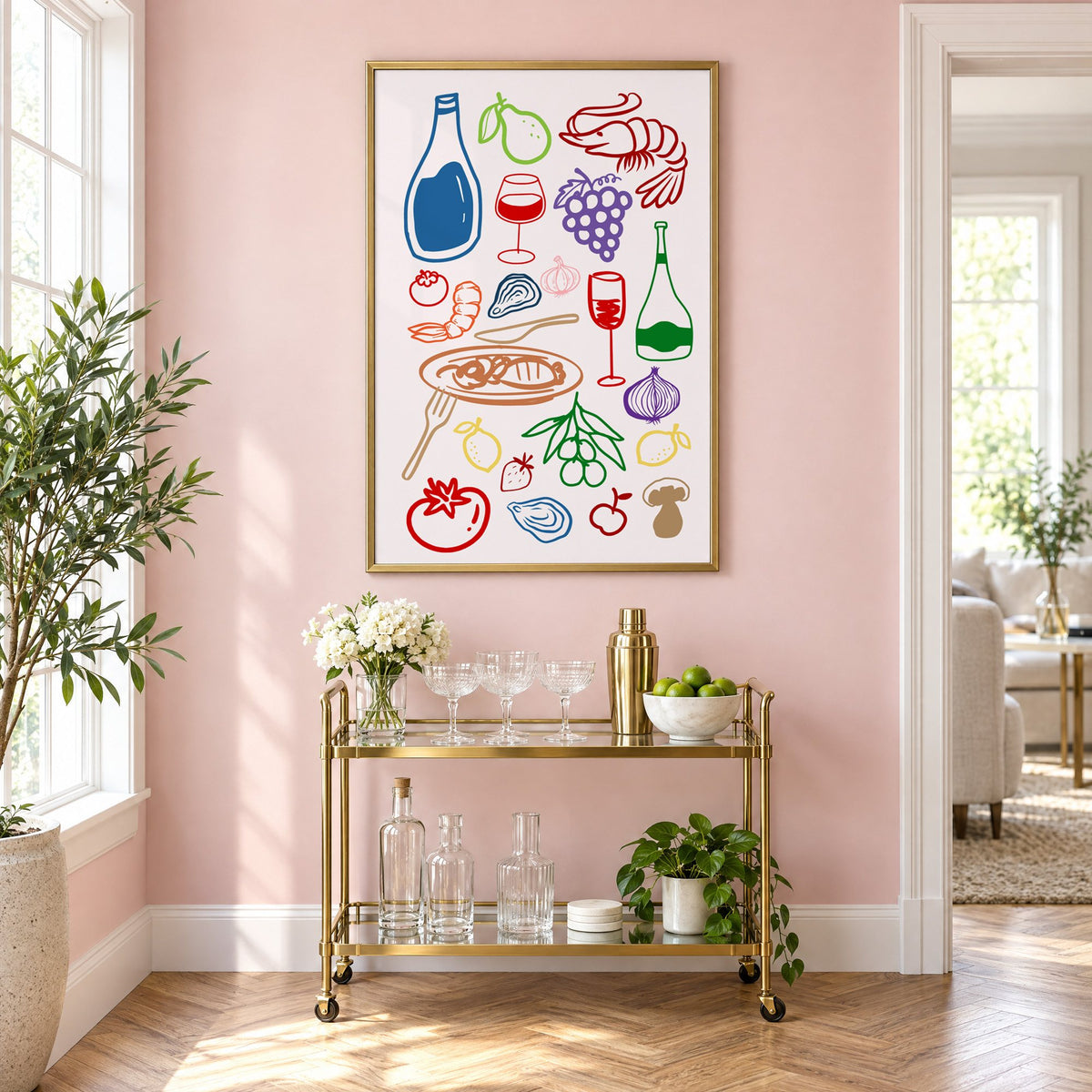 Colorful line art wine seafood feast print in a brass frame above a gold bar cart on a blush pink wall