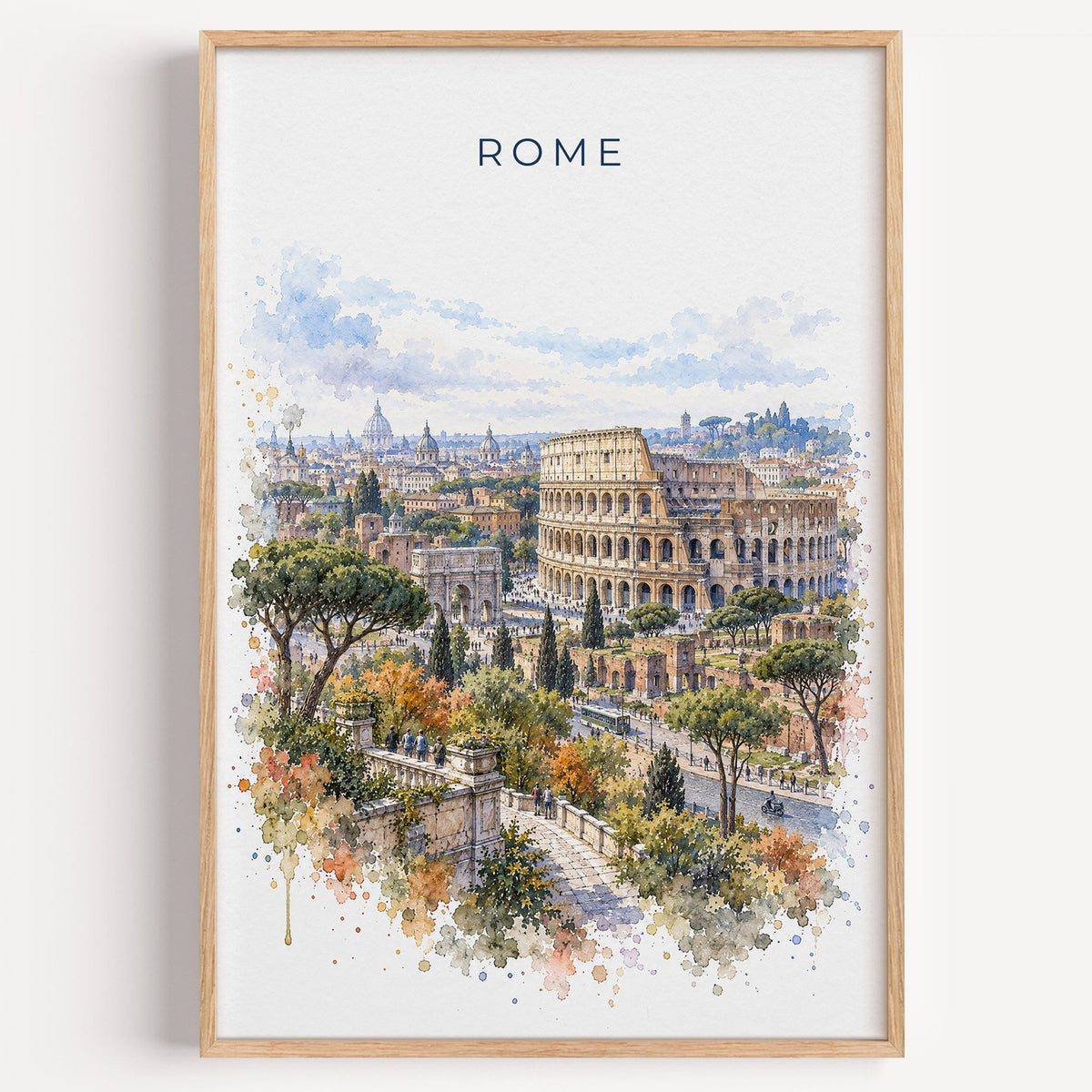 Colosseum watercolor print in a light oak frame on a plain white wall