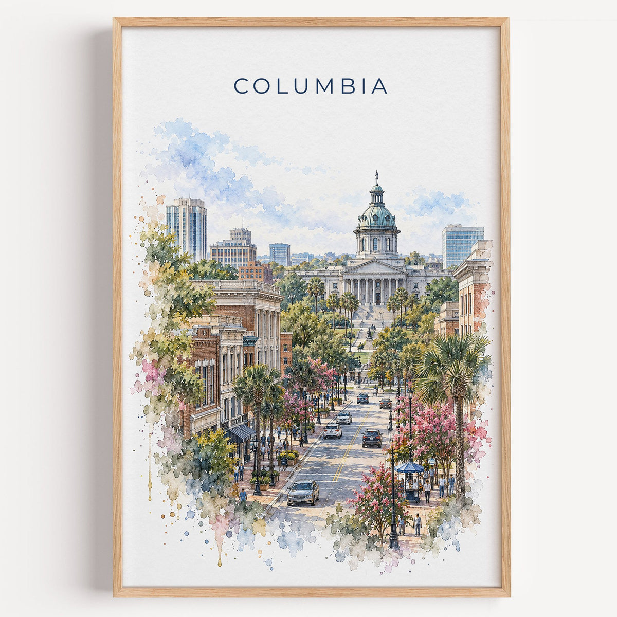 Columbia, South Carolina watercolor print in a light oak frame on a plain white wall