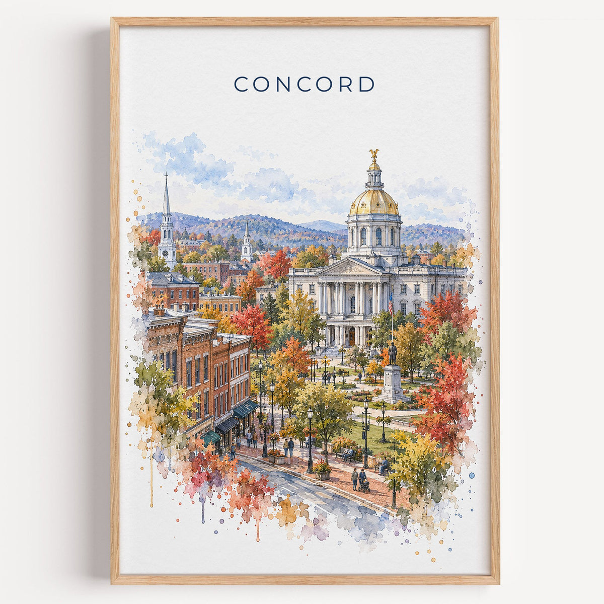 Concord, New Hampshire watercolor print in a light oak frame on a plain white wall