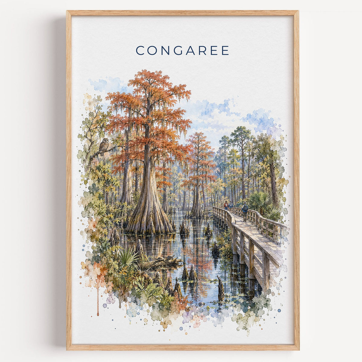 Congaree National Park watercolor print in a light oak frame on a plain white wall