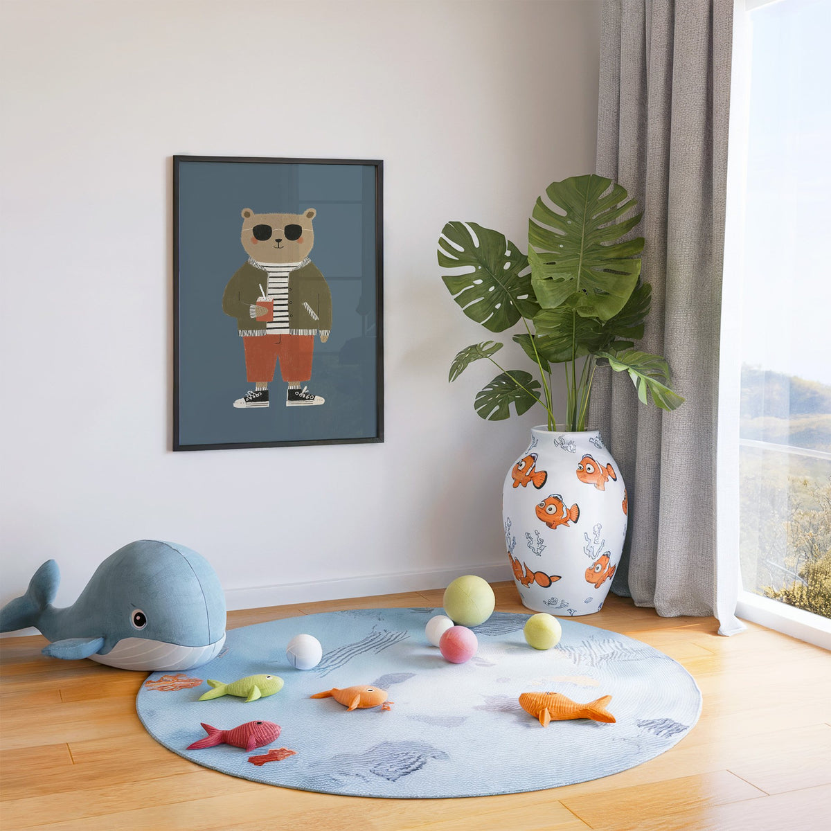 Cool bear sunglasses juice box nursery print in a black frame in a playroom with an ocean rug and whale plush
