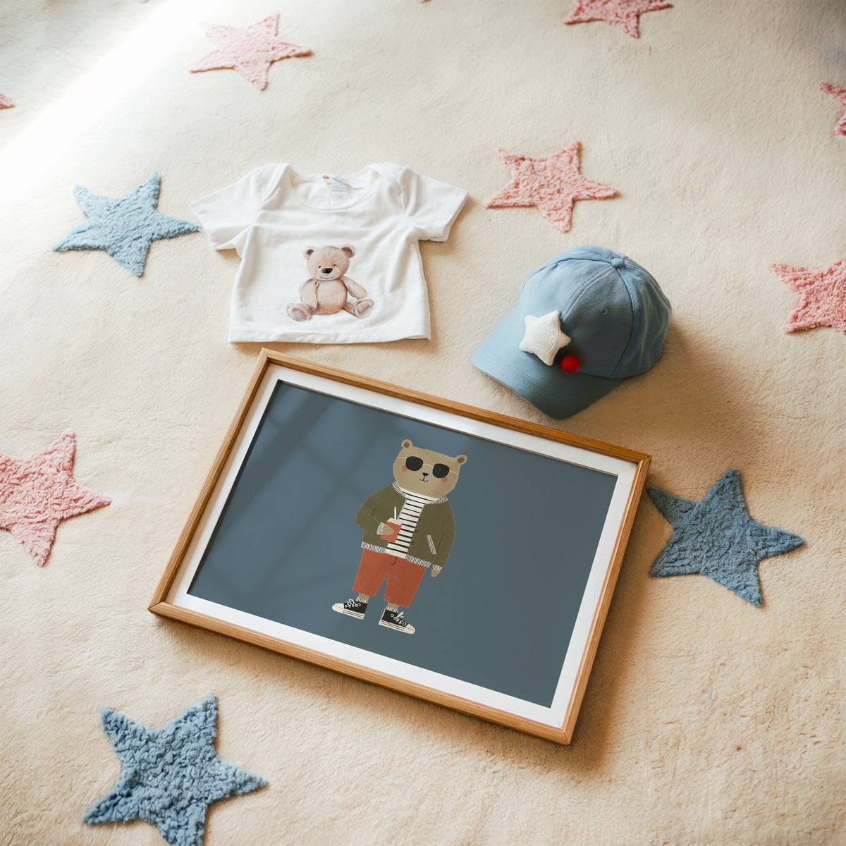 Landscape cool bear sunglasses juice box nursery print in a matted oak frame on a star rug with a baby tee