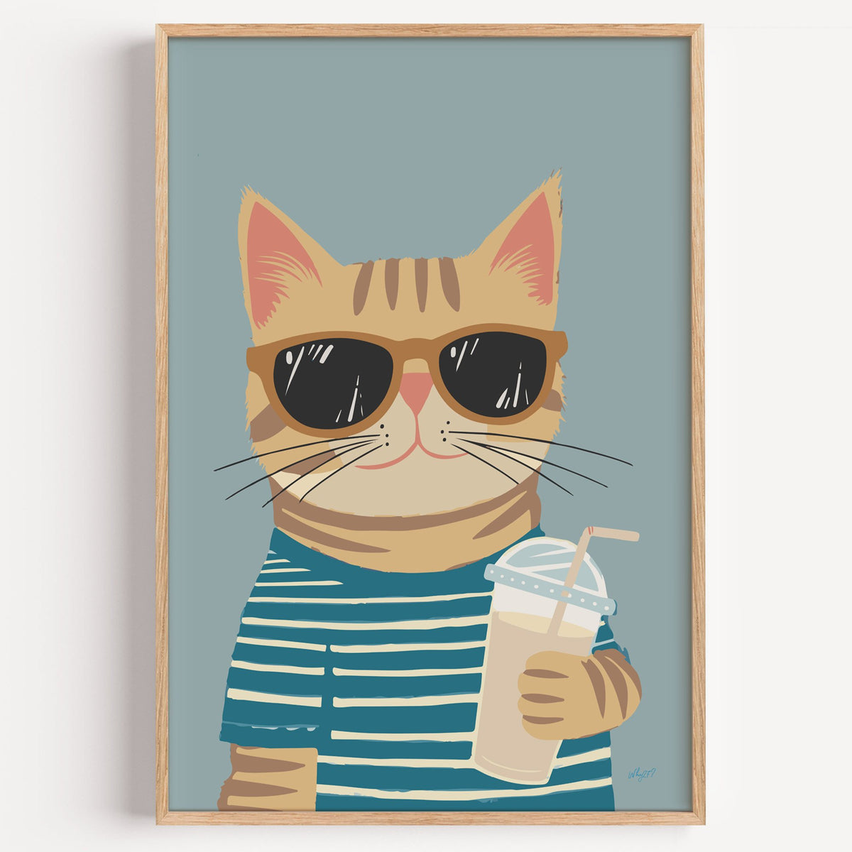 Orange tabby cat with iced drink nursery print in a light oak frame on a plain white wall