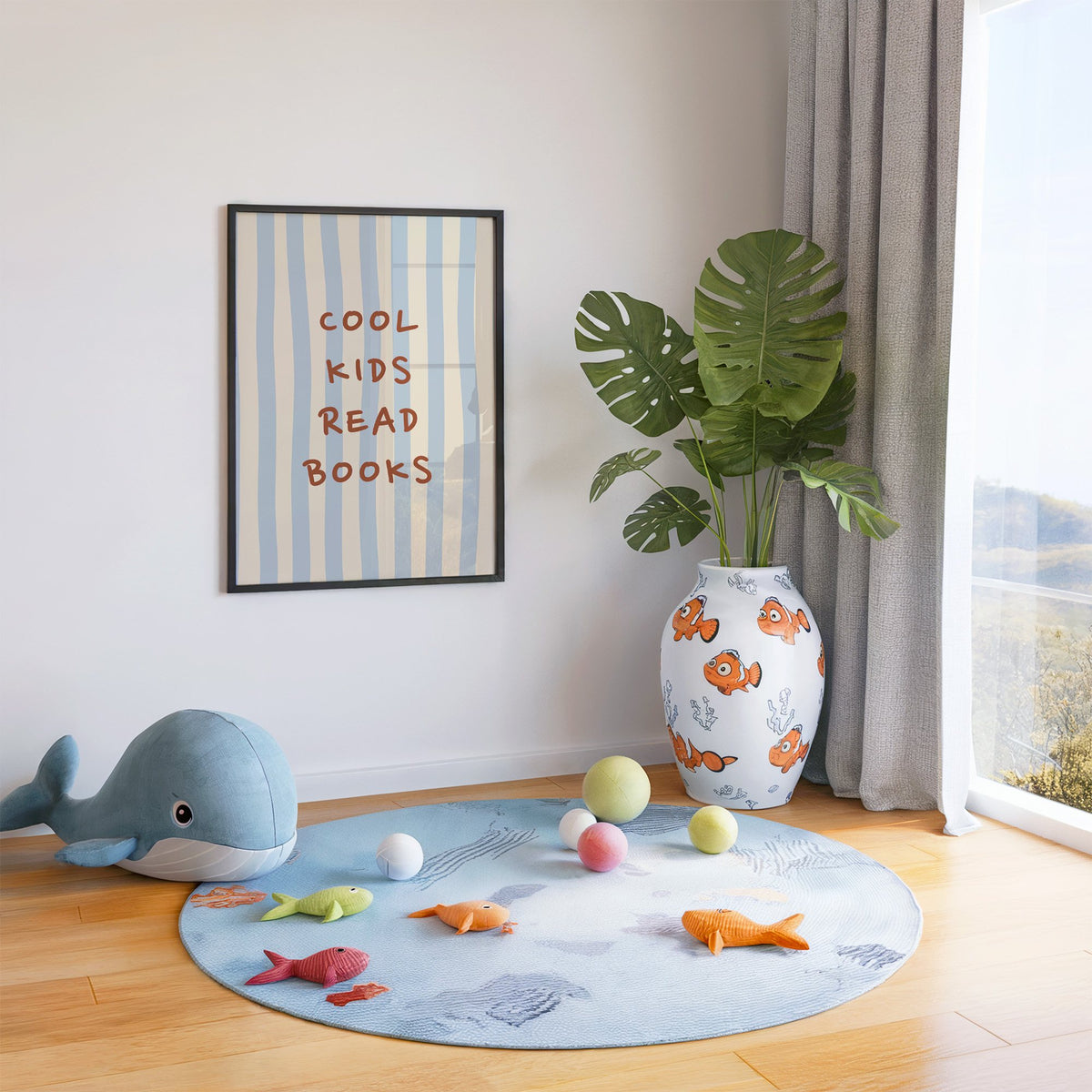 Cool kids read books blue stripe nursery print in a black frame in a playroom with an ocean rug and whale plush