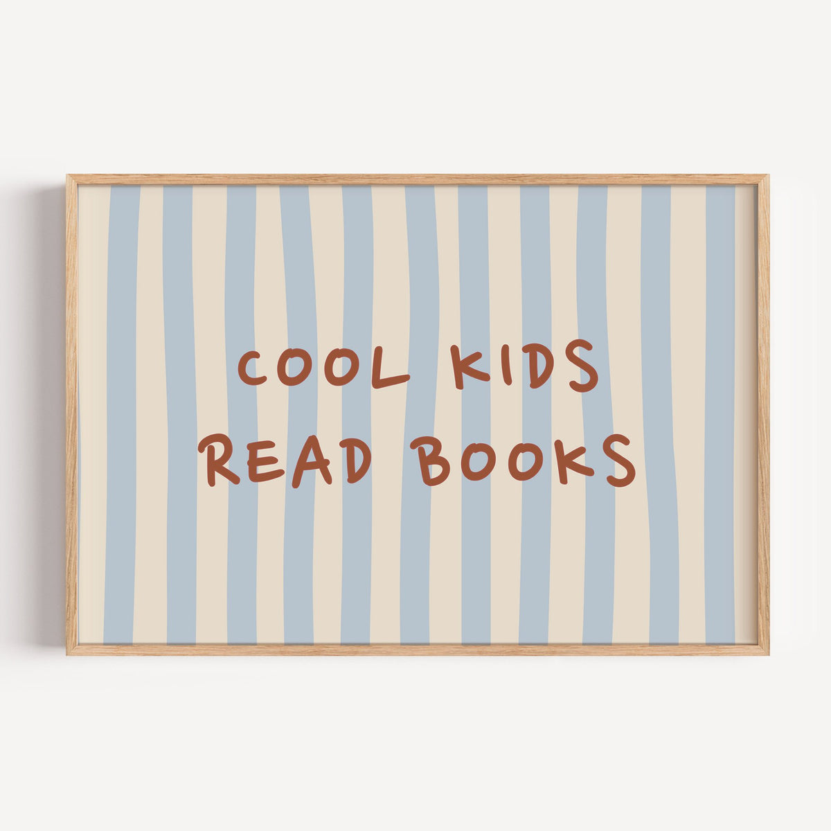 Landscape cool kids read books blue stripe nursery print in a light oak frame on a plain white wall