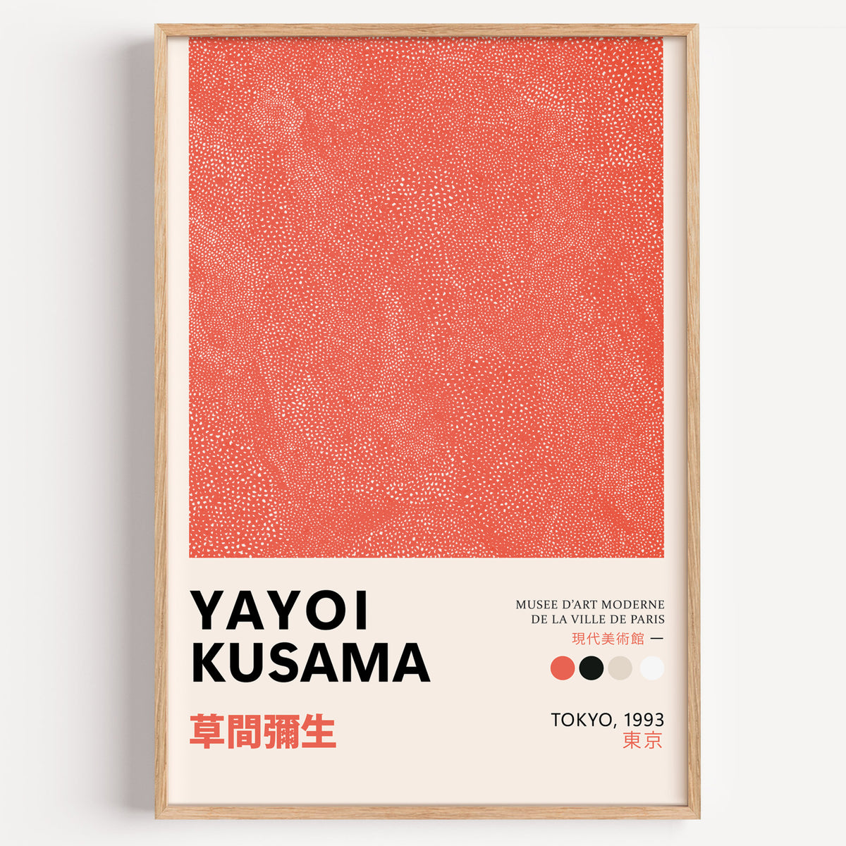 Yayoi Kusama inspired coral dotted texture print in a wood frame on a plain wall