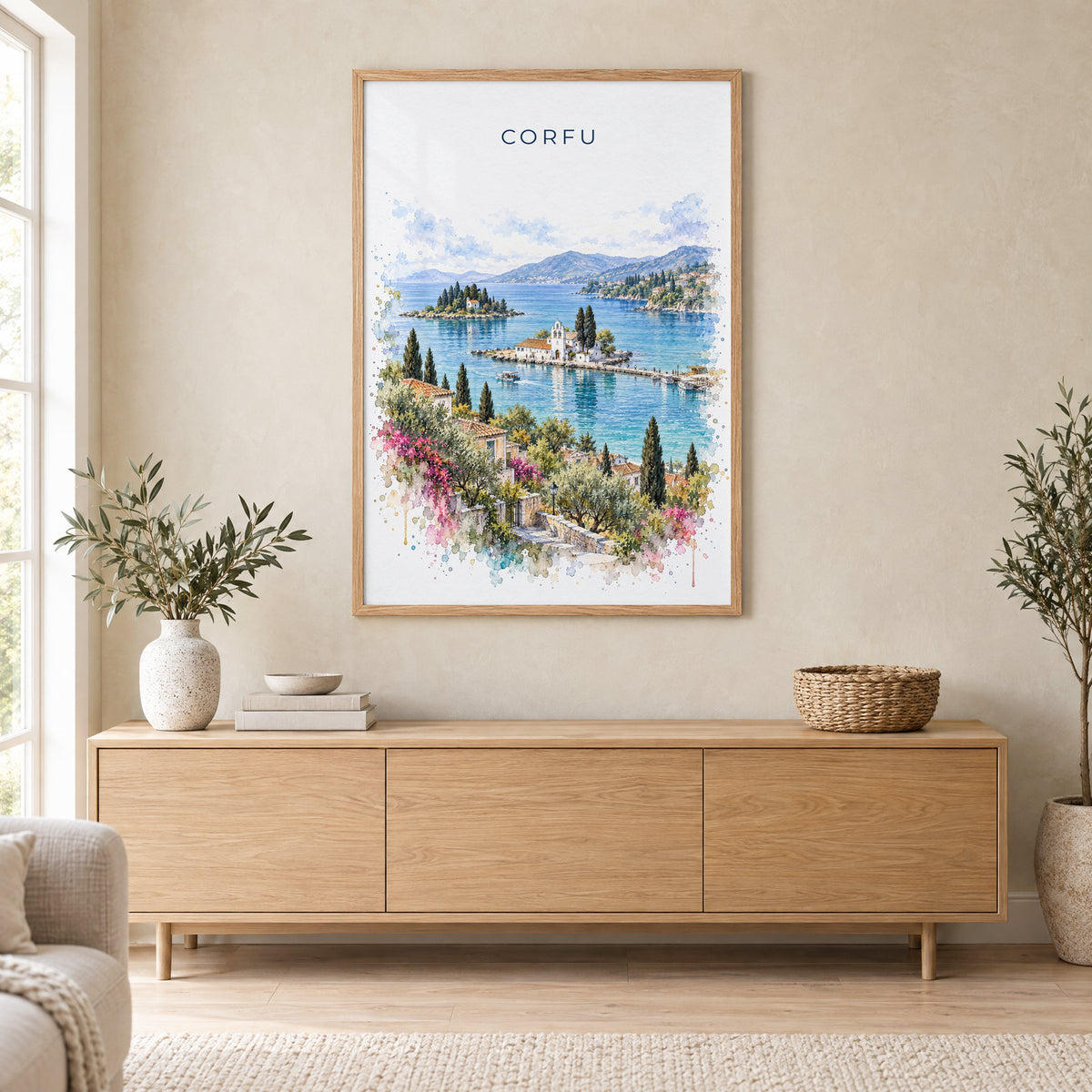 Corfu watercolor print in an oak frame above a light wood sideboard in a Scandinavian living room