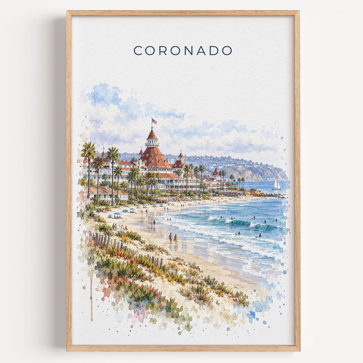 Coronado watercolor print in a light oak frame on a plain white wall