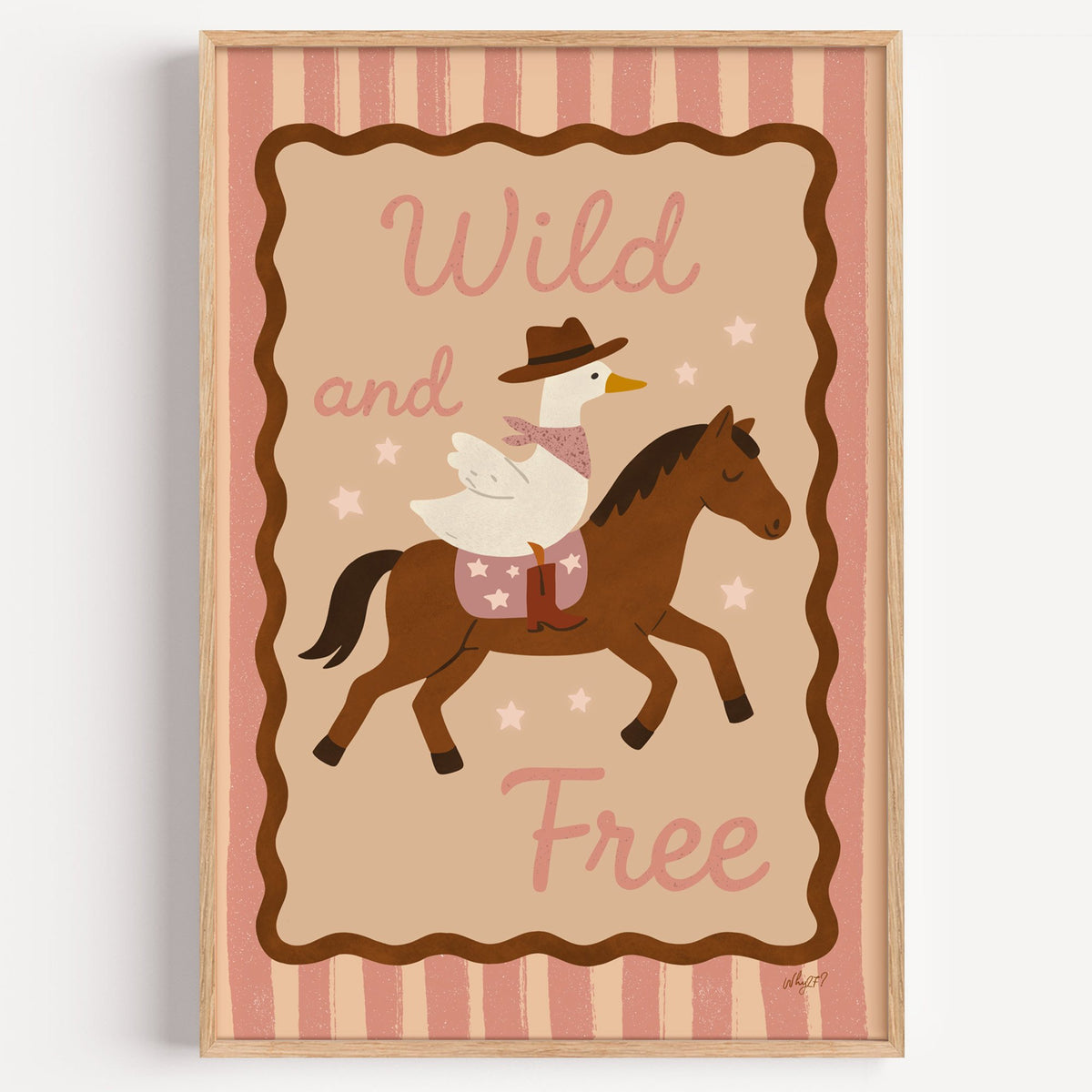 Cowboy goose riding a brown horse nursery print in a light oak frame on a plain white wall