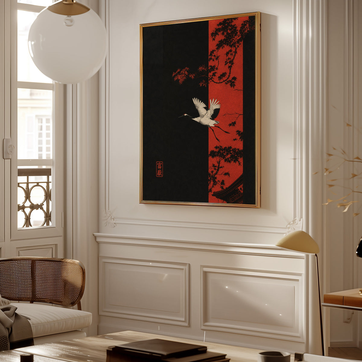 white crane and red maple print shown in a gold frame on a paneled wall in a Parisian-style living room