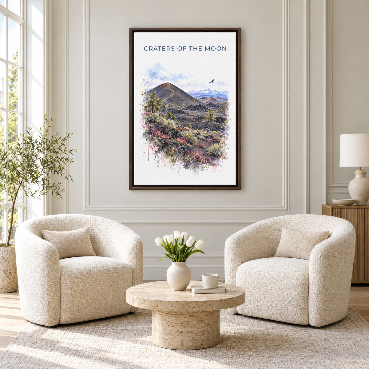 Craters of the Moon National Monument watercolor as an espresso floater canvas above two boucle armchairs in a hotel lounge