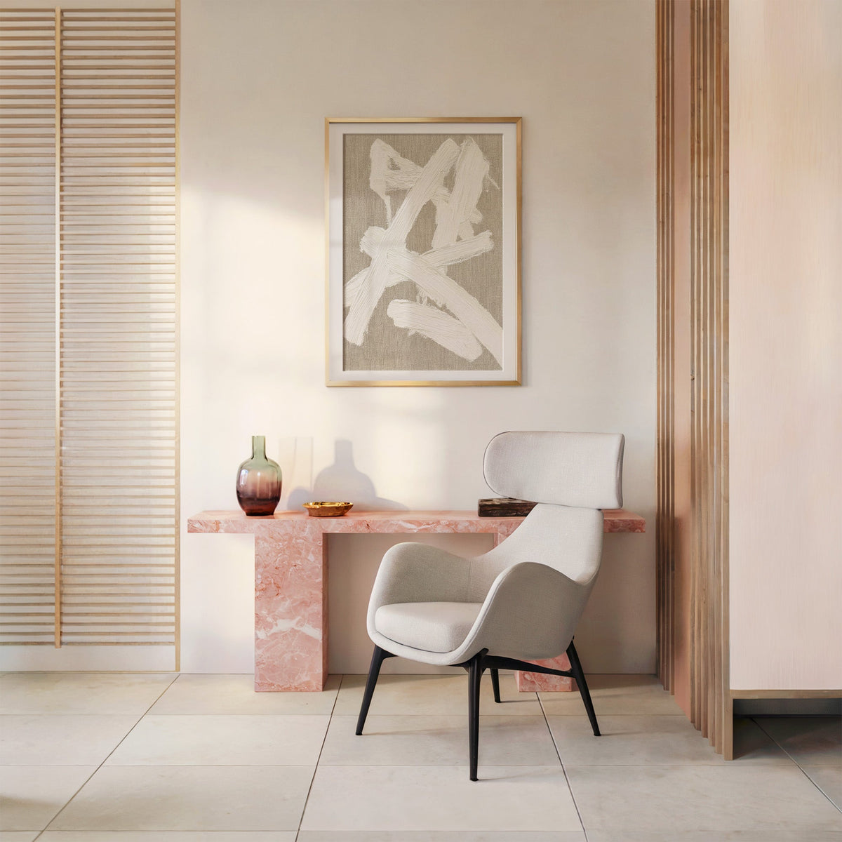 Cream impasto crossed strokes on linen print shown in a gold frame with a mat above a pink marble console and armchair