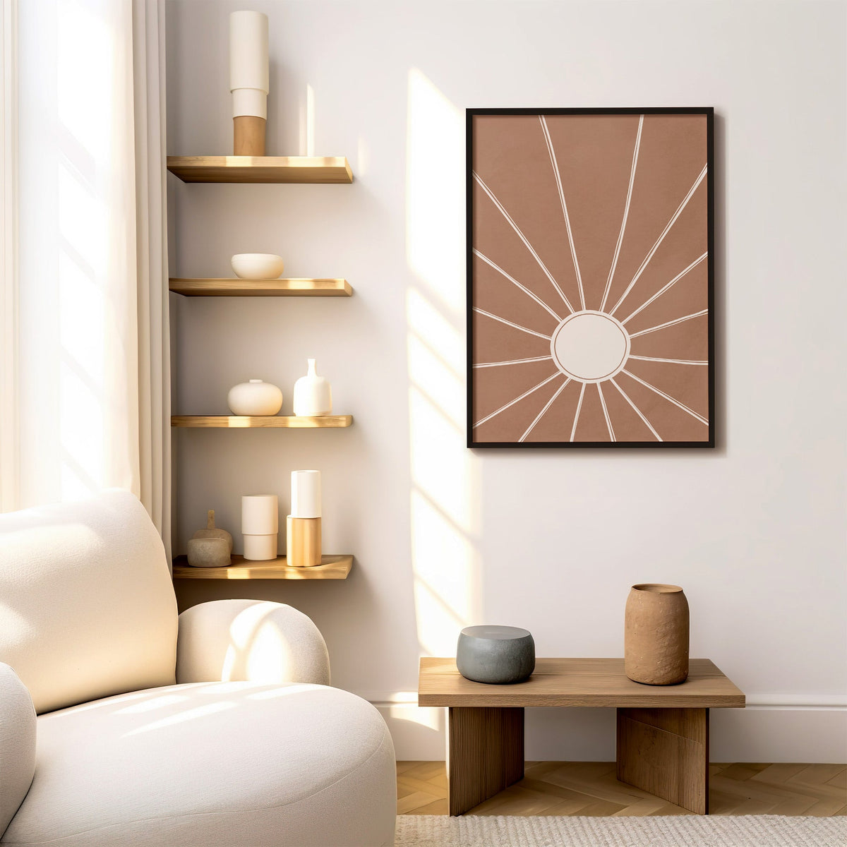 Cream sunburst rays on terracotta boho print in a black frame above a low wood bench beside floating oak shelves