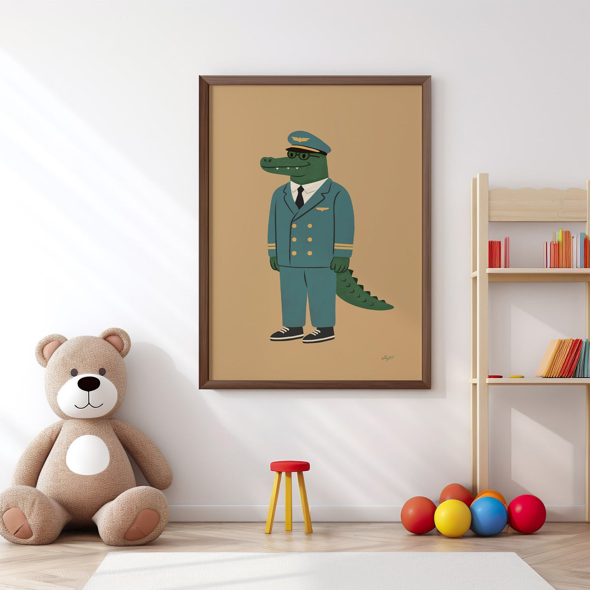 Crocodile in teal pilot uniform nursery print in a walnut frame above a big teddy bear by a bookshelf