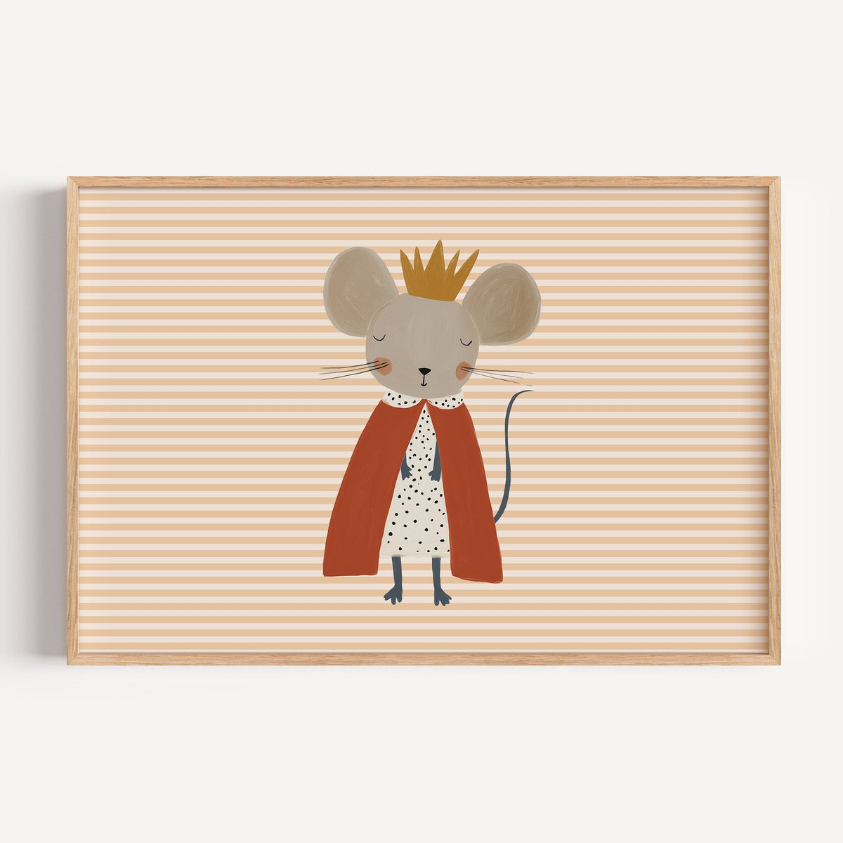 Landscape crowned mouse red cape nursery print in a light oak frame on a plain white wall