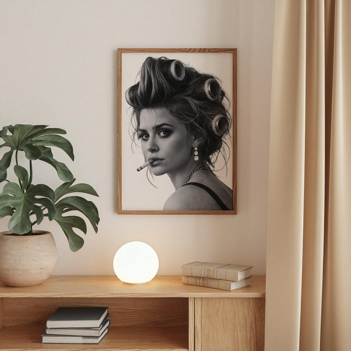 Woman in big curlers looking over shoulder print in a walnut frame above an oak cabinet with a glowing globe lamp